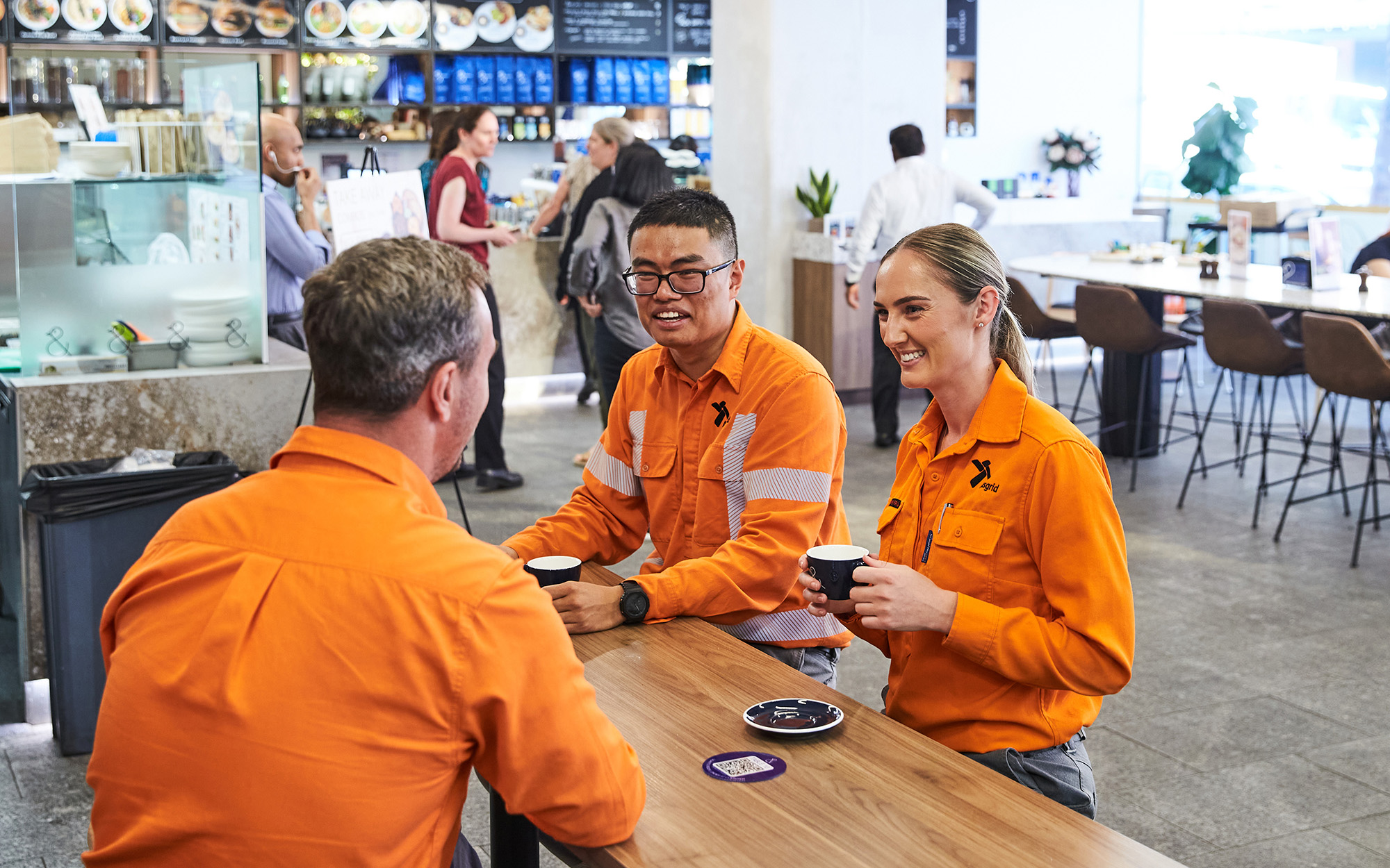 Members of Ausgrid's Field Services Group in a meeting together in Roden Cutler House, Sydney Cafe