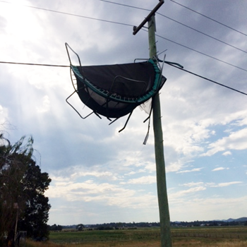 Safety Share - a trampoline blown away into overhead power lines