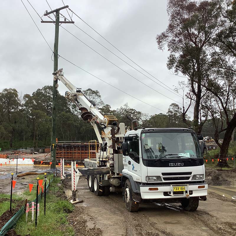 Ausgrid crew holding a pole